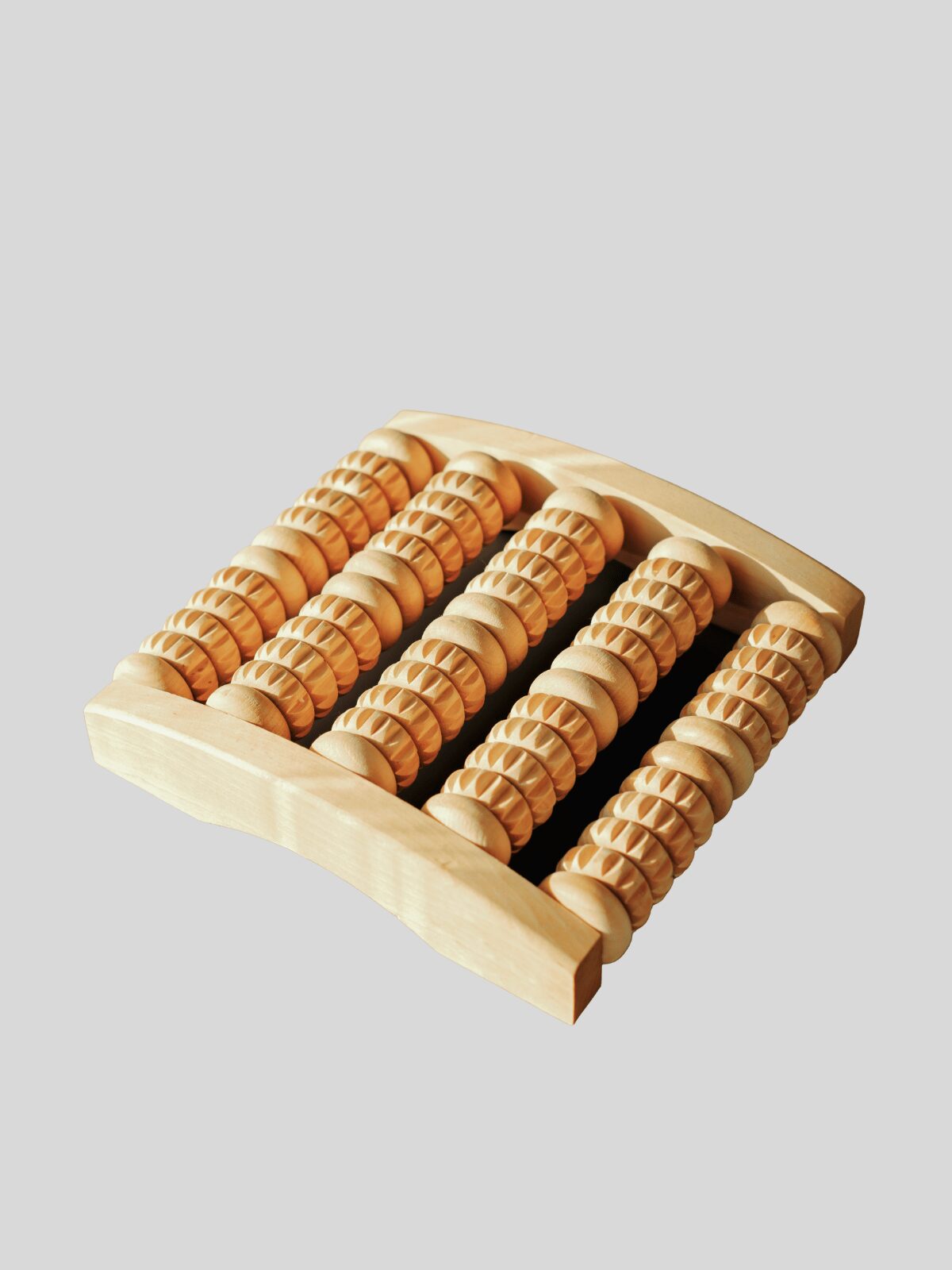 masseur pied en bois